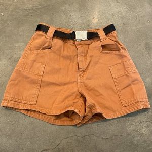 Highwaisted brown cargo shorts. From Topshop.